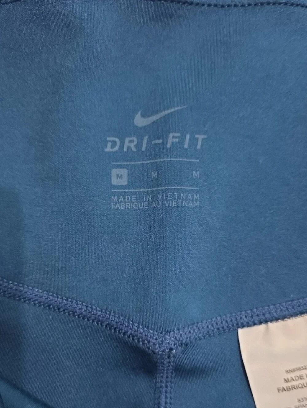 Nike Blue Women's Athletic Leggings with Gold Swoosh